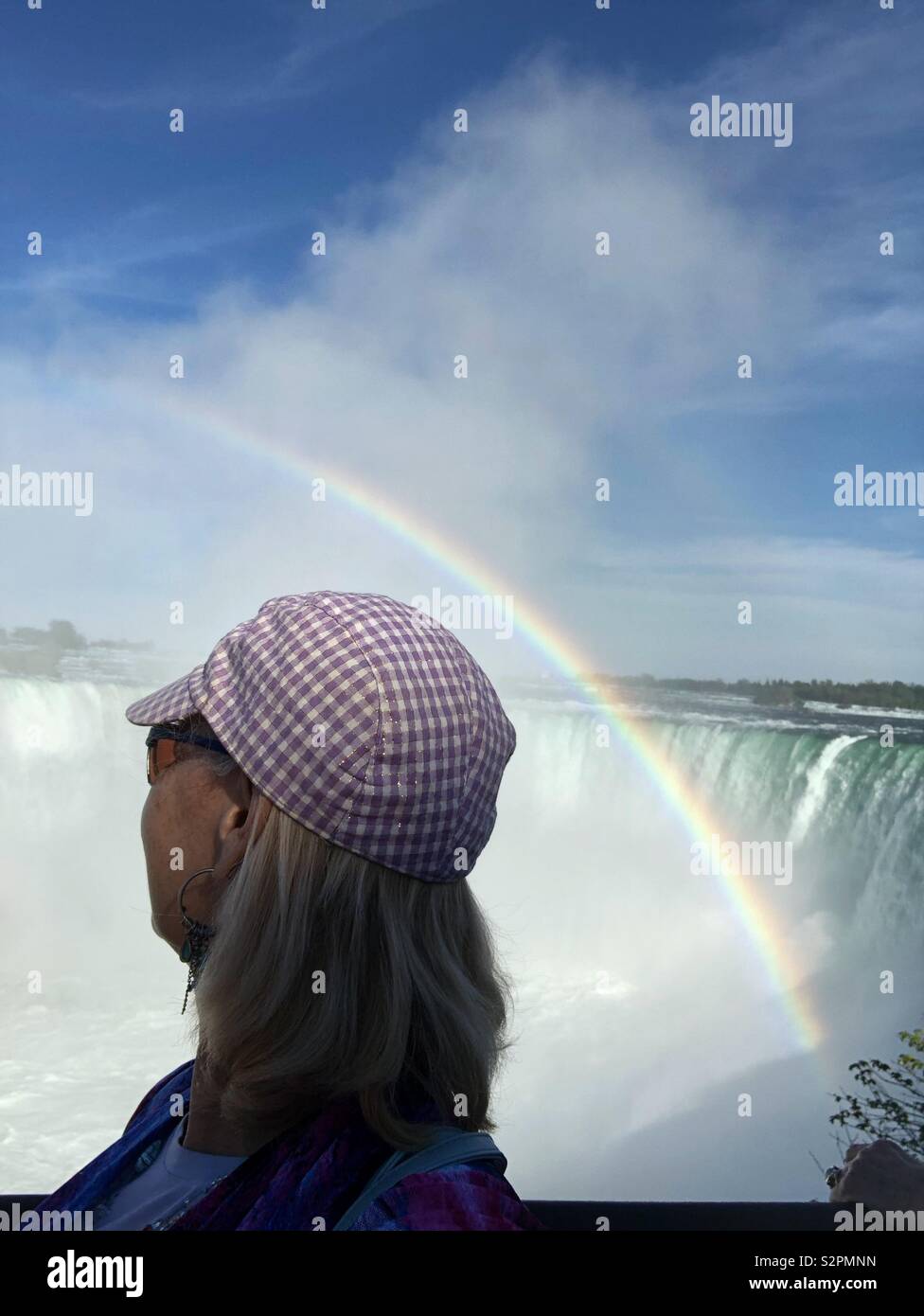 A woman looking at the Horseshoe Falls, Niagara Falls, Canada. - Smartphone Captured Stock Image