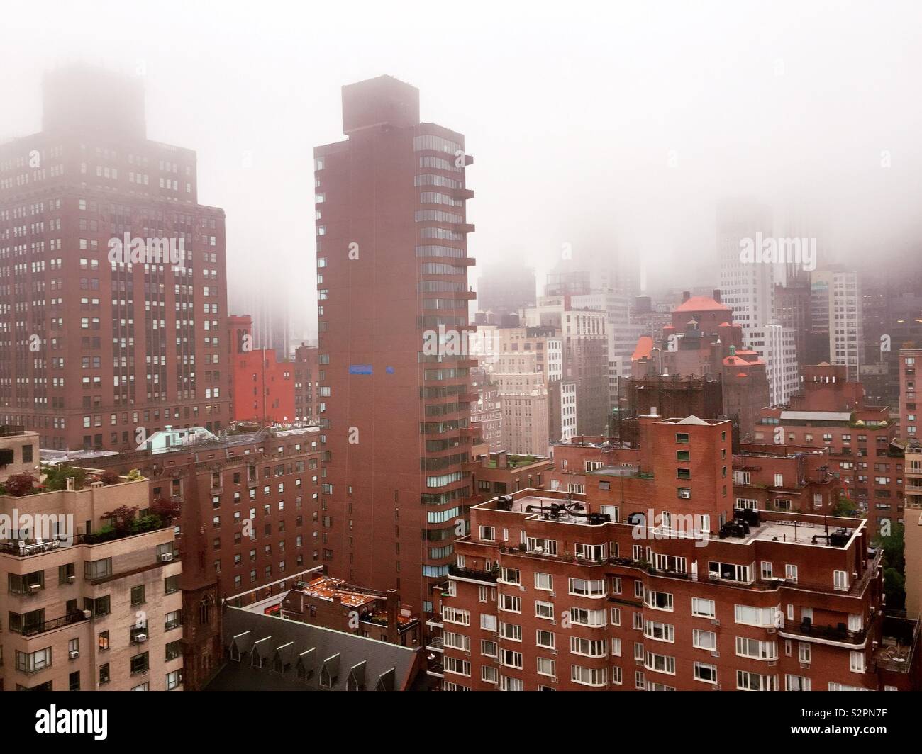 Frog obscure is the view of skyscrapers and other buildings in midtown Manhattan, NYC, USA - Smartphone Captured Stock Image