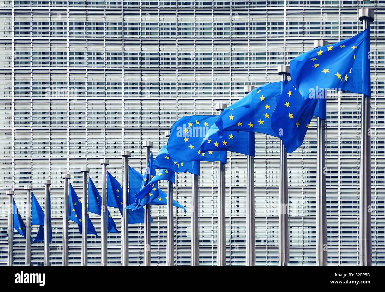 European Union flags flying in front of the European Commission building,Brussels Stock Photo