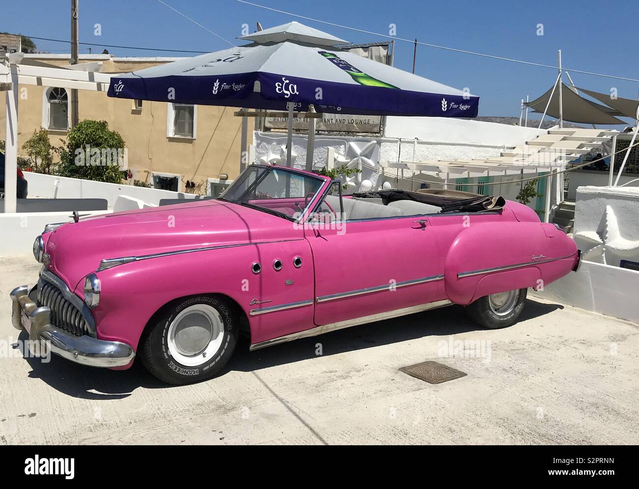 Pink Cadillac. Santorini Stock Photo