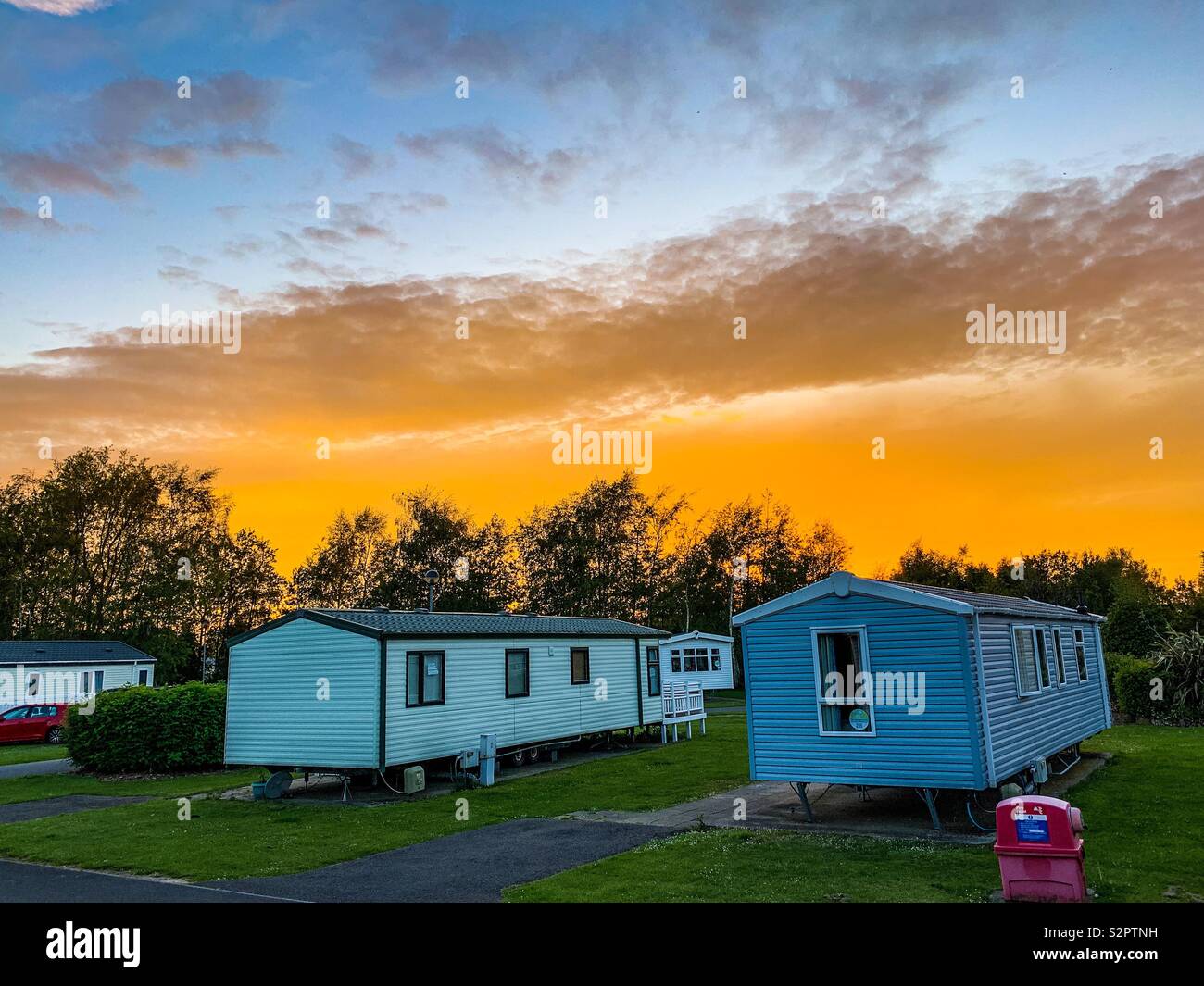 Orange sky at a caravan site - Smartphone Captured Stock Image
