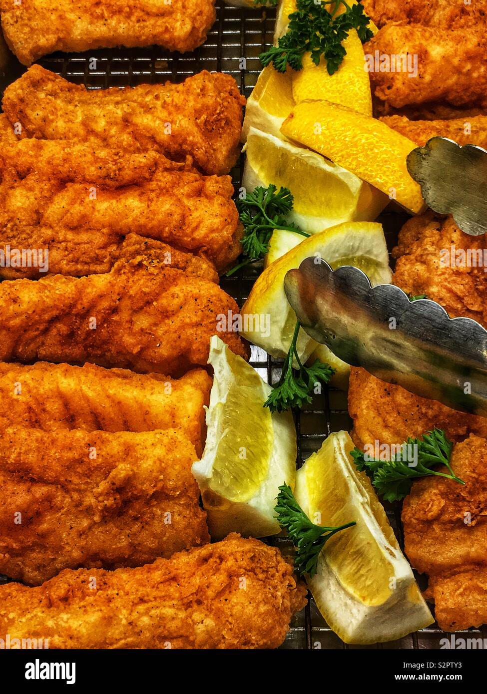 Fresh delicious tasty fried fish served in a buffet Stock Photo Alamy