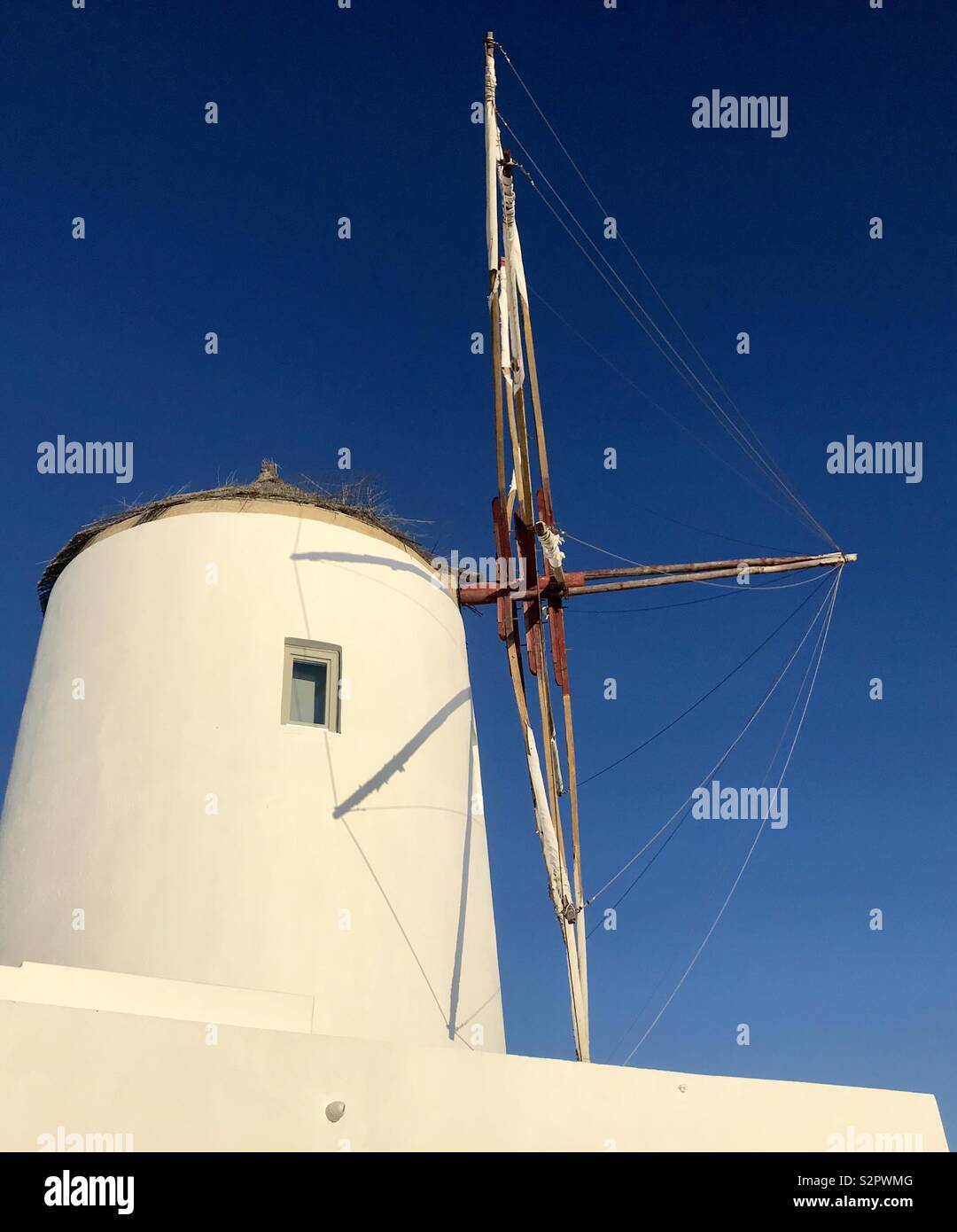 Windmill in Oia Santorini - Smartphone Captured Stock Image