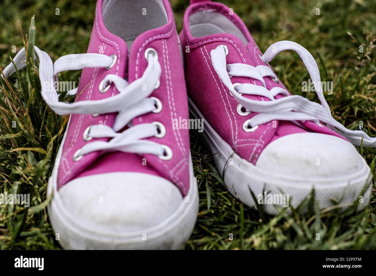 Pink kids sneakers - Smartphone Captured Stock Image