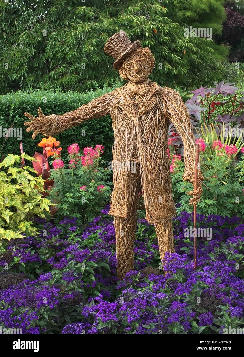 A scarecrow made from willow in the gardens of Homestead Park, York - Smartphone Captured Stock Image