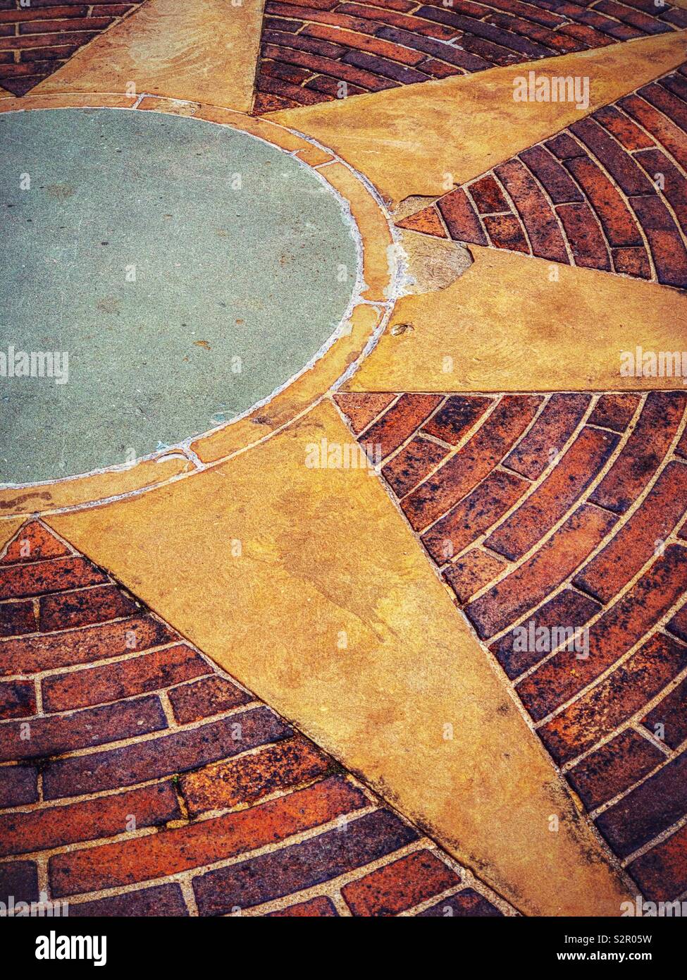 Detail of star paving and red bricks. Stock Photo