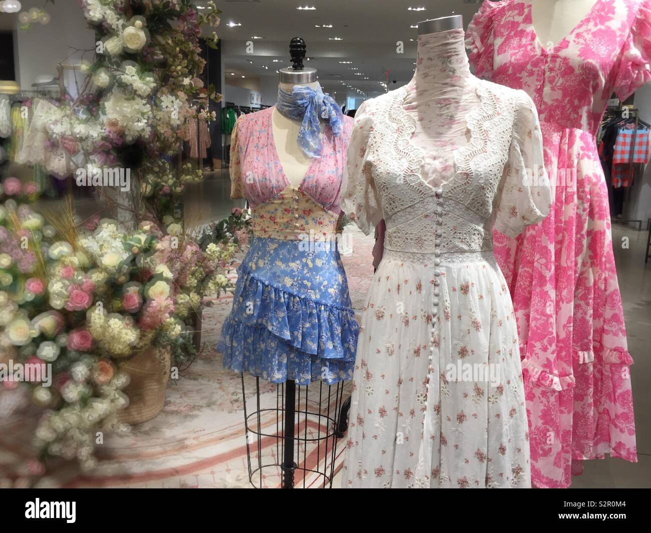 Saks Fifth Avenue Display of frilly summer dresses, NYC, USA Stock Photo -  Alamy