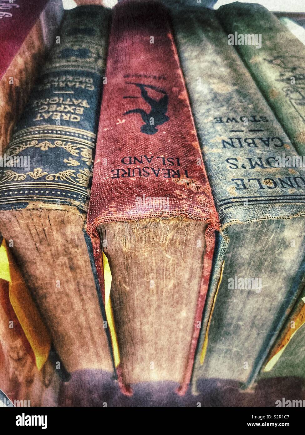 Worn classic books on display - Smartphone Captured Stock Image