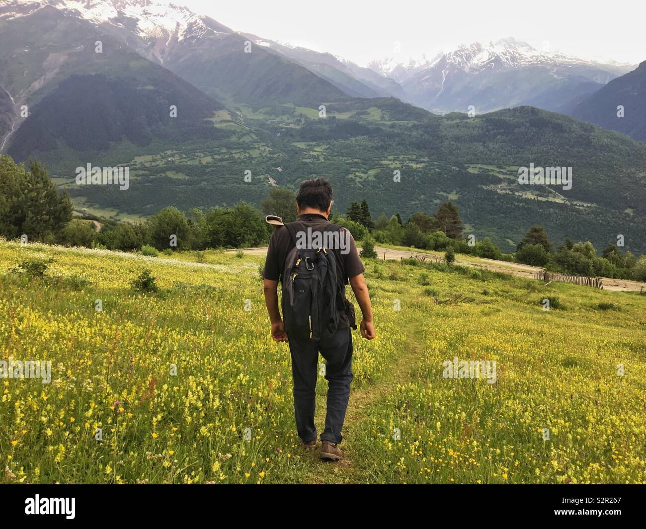 Hiking down through the mountains Stock Photo