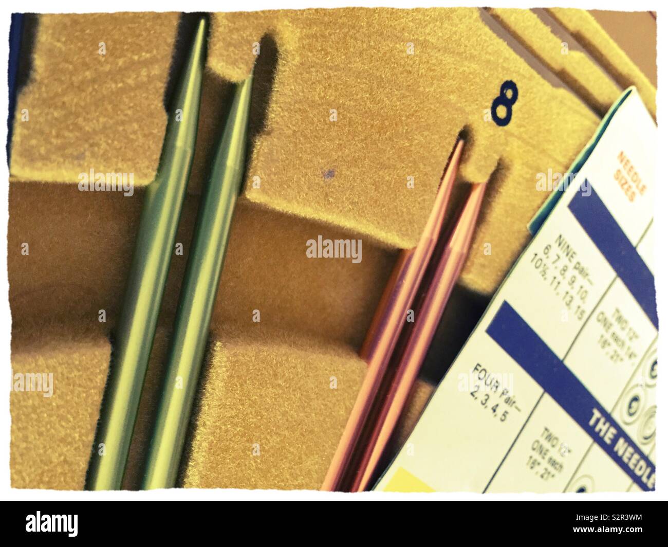 Vintage knitting needle set and printed instructions, USA - Smartphone Captured Stock Image