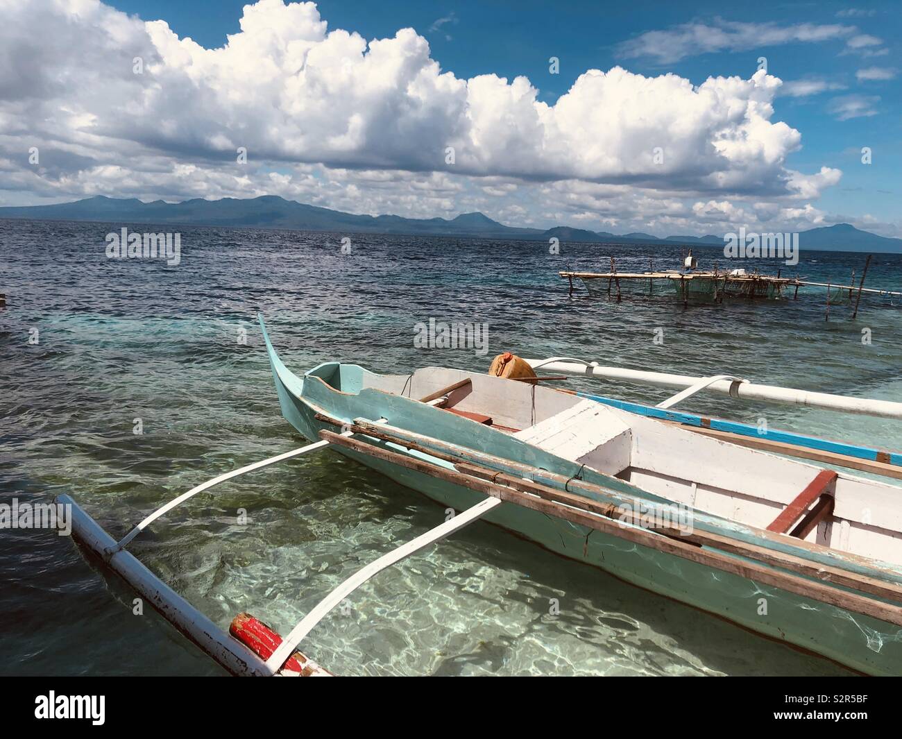 Boat docked at Minis Island in Patikul, Sulu, Philippines. - Smartphone Captured Stock Image