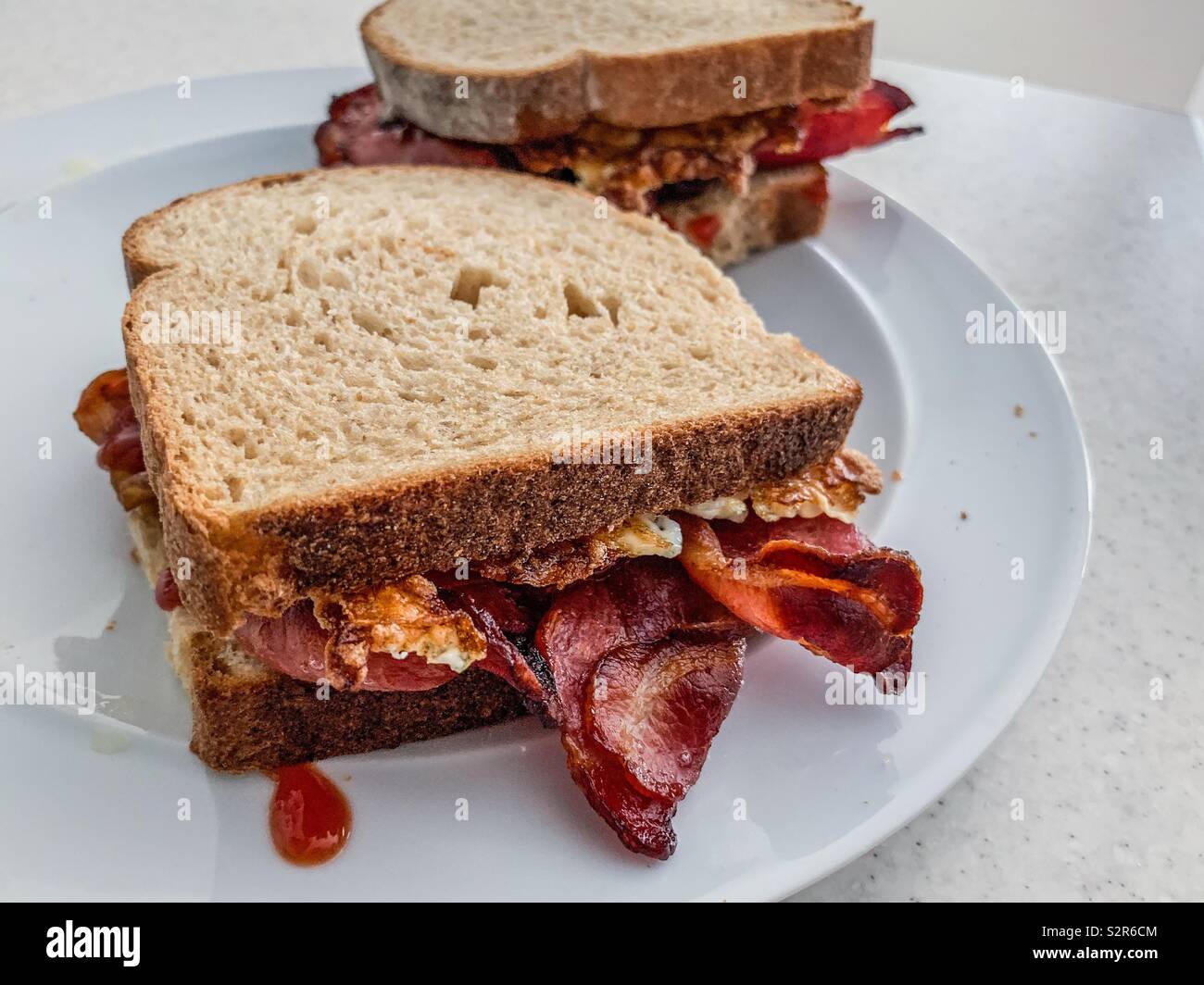 Egg and bacon butty Stock Photo