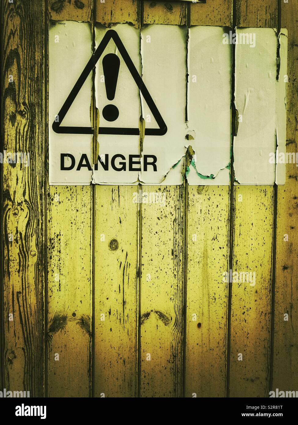 Worn danger sign hi-res stock photography and images - Alamy