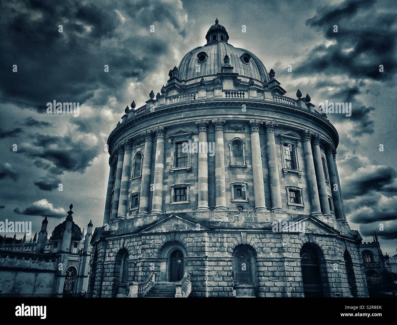 An atmospheric image of the Radcliffe Camera building in the central area of Oxford, England. This building is used as a reference library and is an integral part of the University of Oxford. © CH. - Smartphone Captured Stock Image