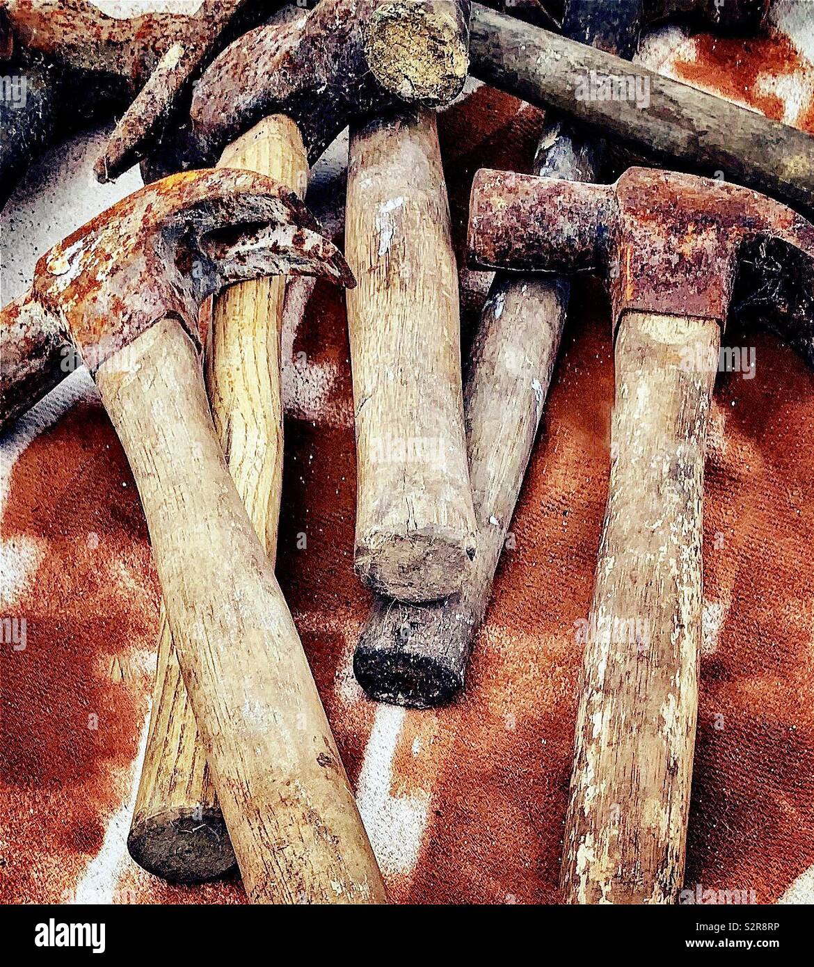 Old wooden handled rusty claw hammers and lump hammer Stock Photo Alamy