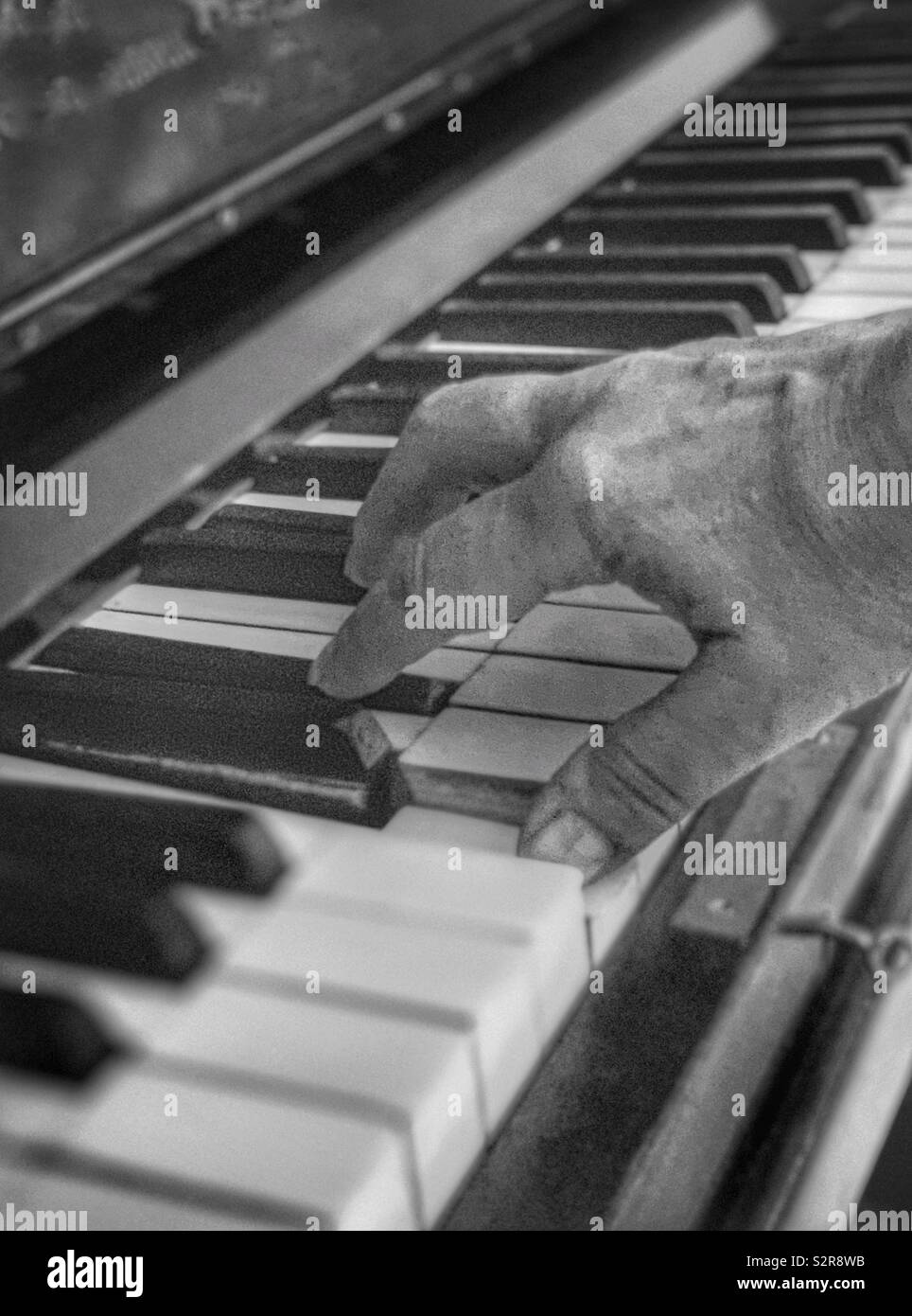I am playing a very old piano very old music. My thumb on the note C Stock  Photo - Alamy