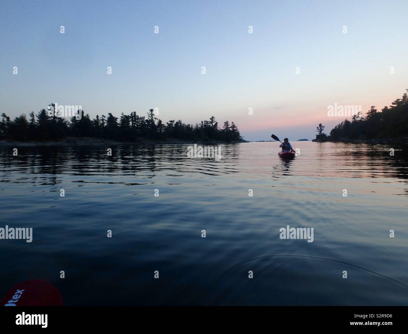 Kayaking Bay Canada Stock Photo Alamy