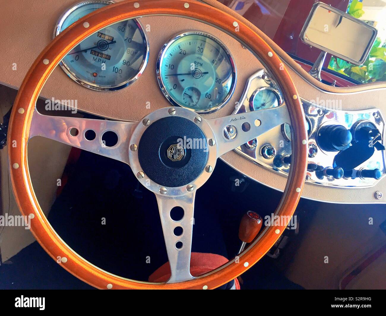 Steering wheel and dashboard of a classic 1953 MG TD - Smartphone Captured Stock Image