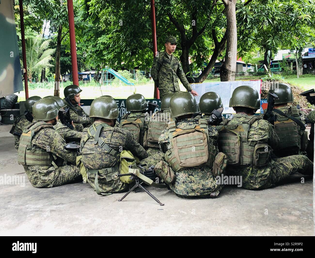 Military briefing inside 303rd Army Brigade against the NPA communist-terrorist group. War against terror groups intensifies around the Philippines. - Smartphone Captured Stock Image