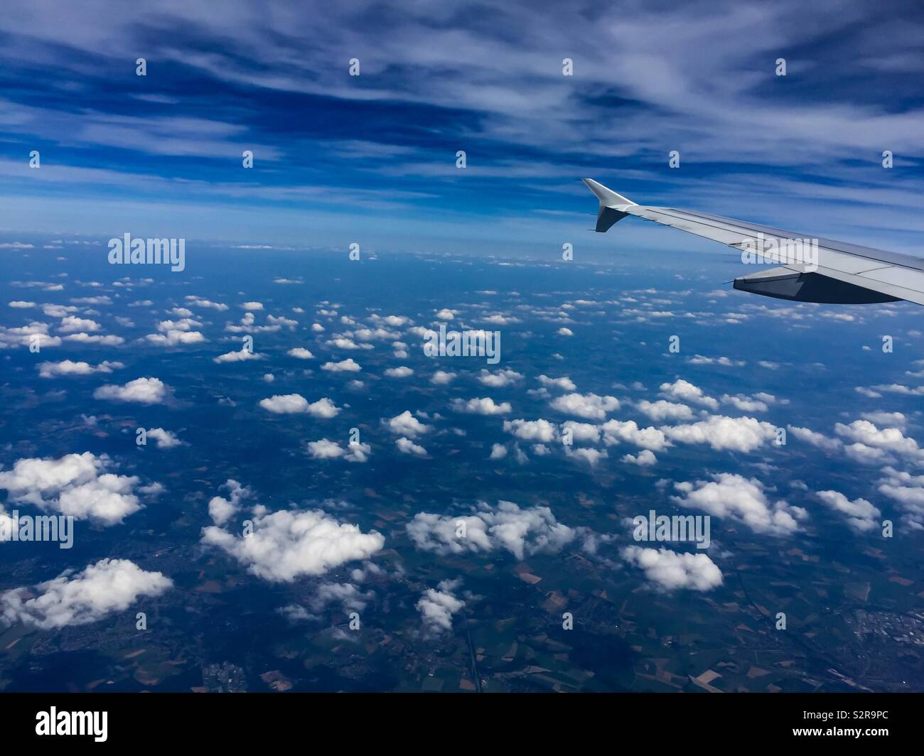 Flying Above The Clouds At 36000 Feet Stock Photo Alamy
