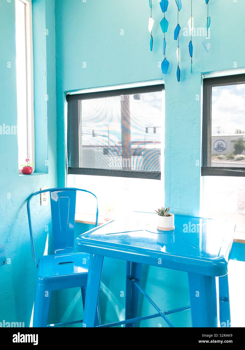 Blue corner table Stock Photo Alamy