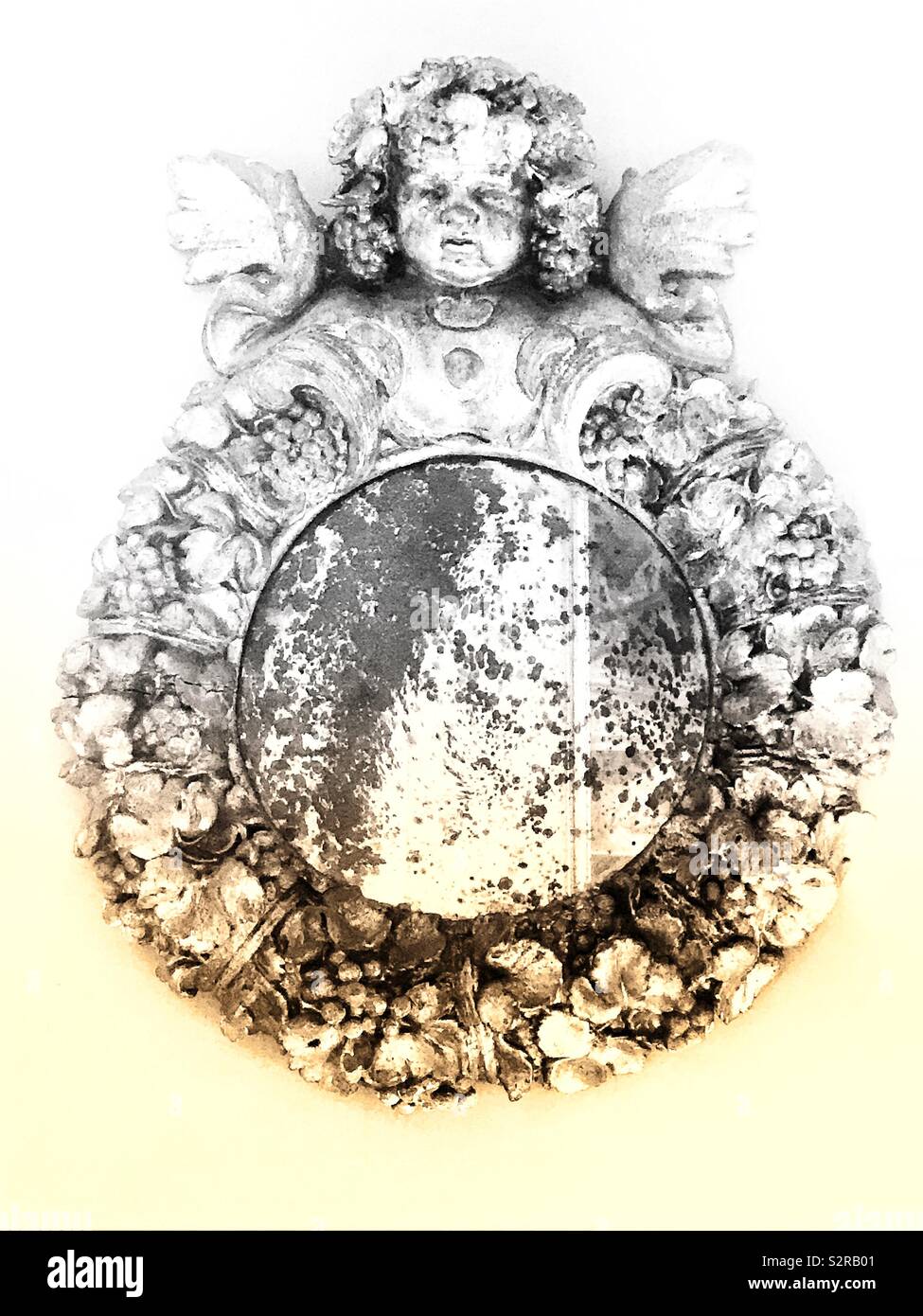 Distressed round mirror with ornate frame Stock Photo Alamy