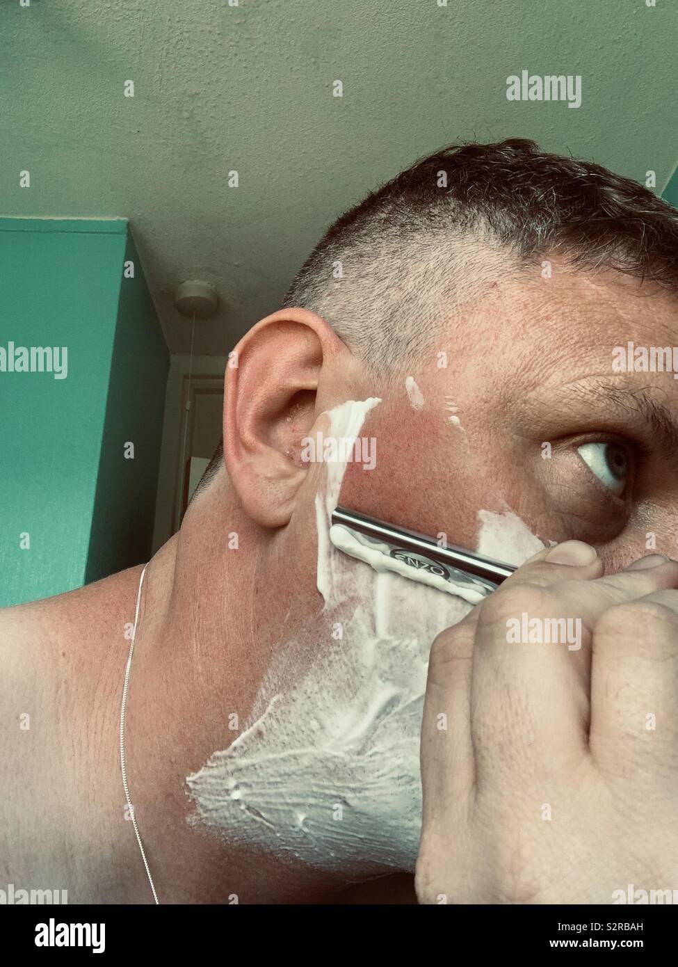 Cut throat hires stock photography and images Alamy