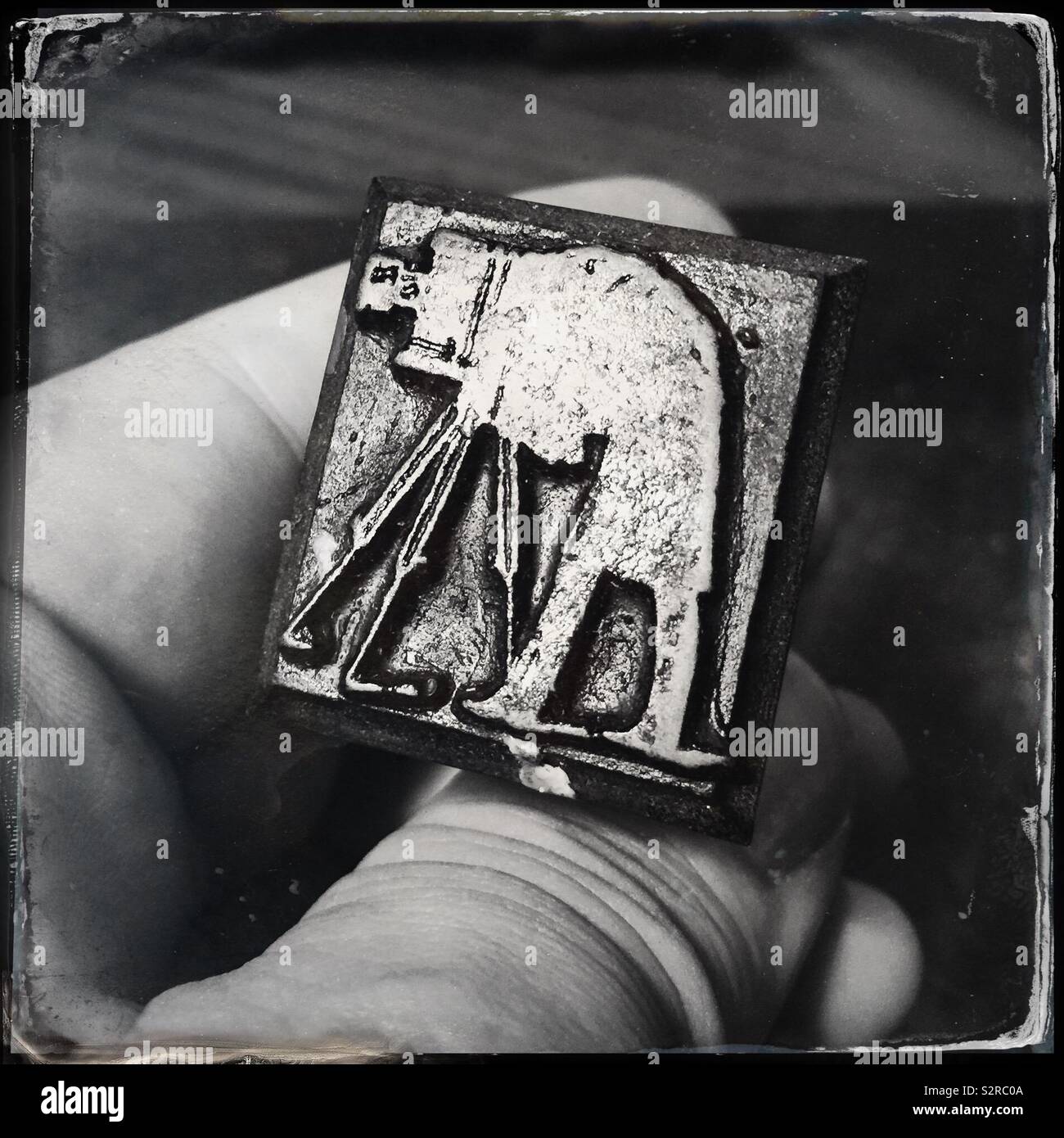 A stamp showing an old-time photographer while he is shooting with a large format camera - Smartphone Captured Stock Image