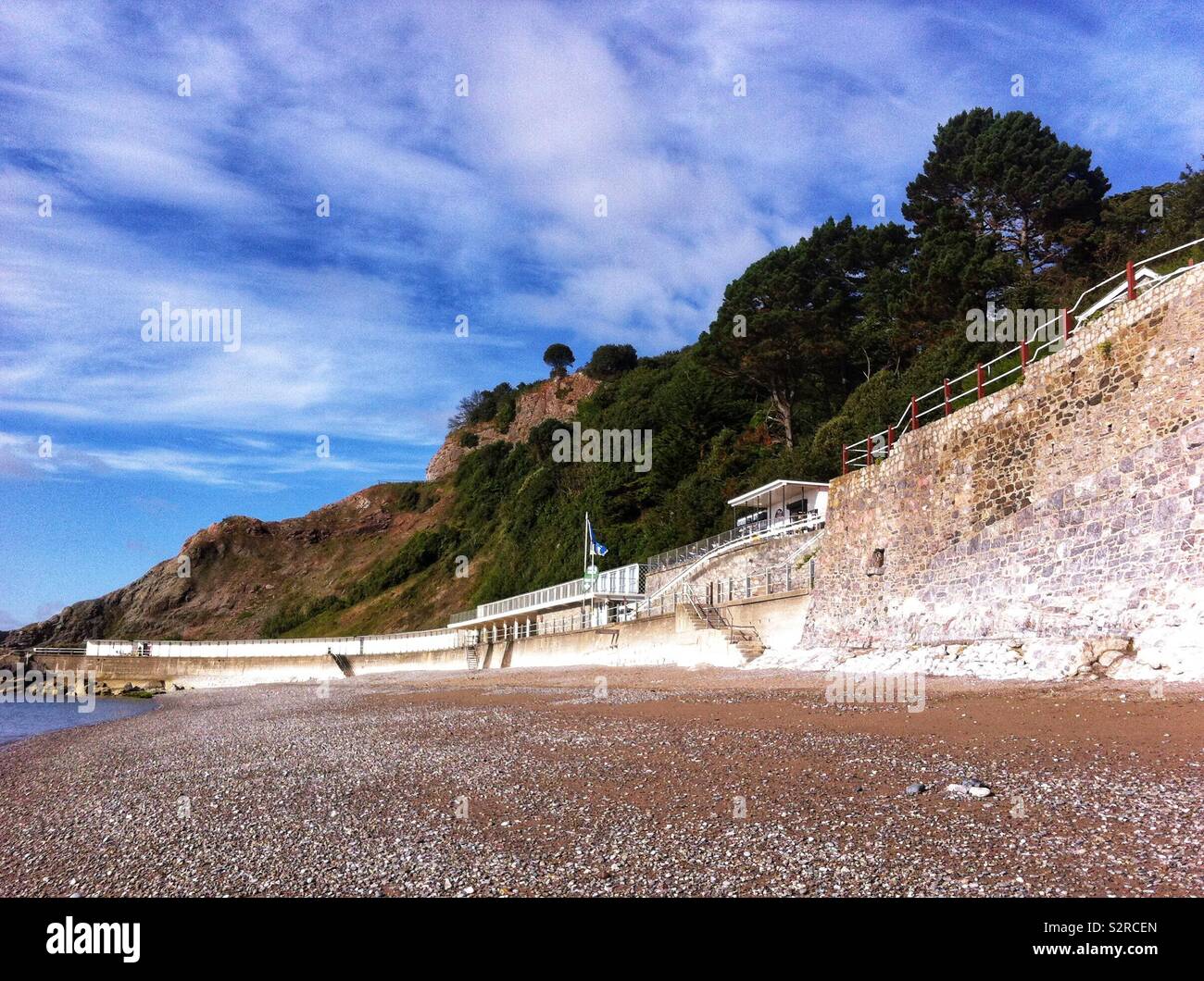 Early morning at Meadfoot, a public beach in Torquay, Devon - Smartphone Captured Stock Image