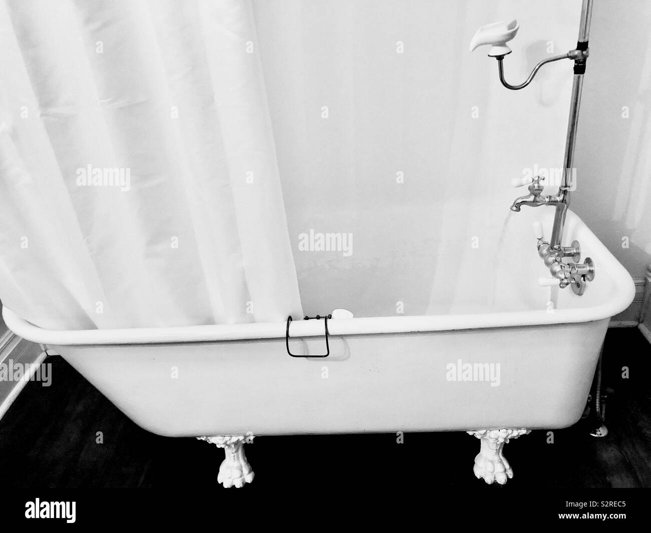 Black and white Antique Claw Foot tub Stock Photo