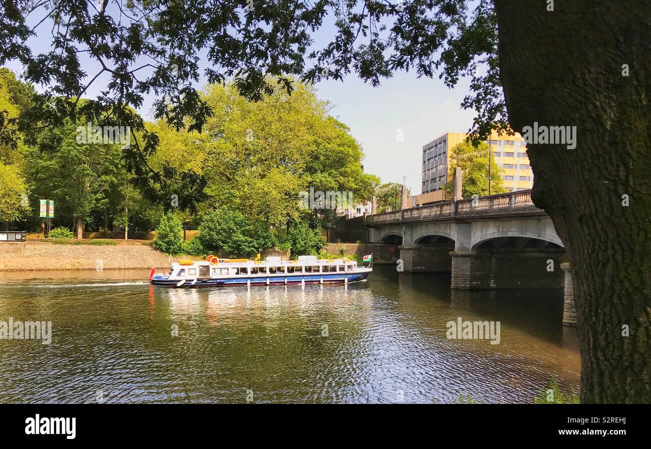 River cruise boat leaving Cardiff city centre to head down the River Taff to Cardiff Bay - Smartphone Captured Stock Image