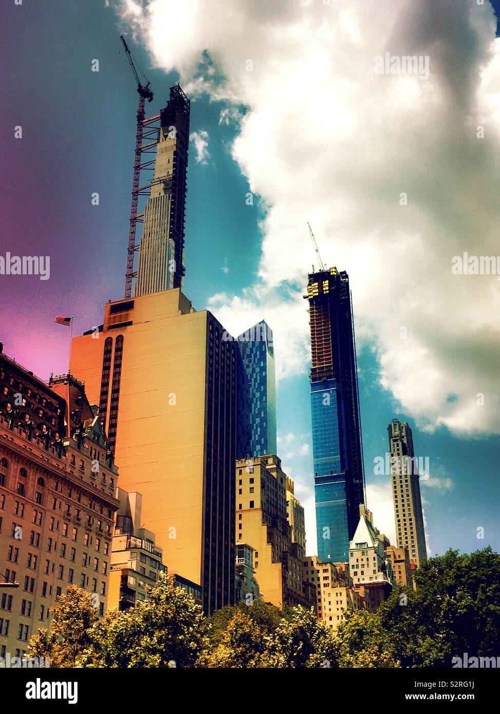 Skyscrapers in super tall construction along Central Park South in Midtown Manhattan, NYC, USA - Smartphone Captured Stock Image
