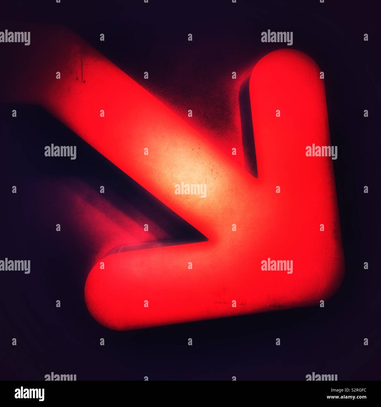Red lighted arrow - Smartphone Captured Stock Image