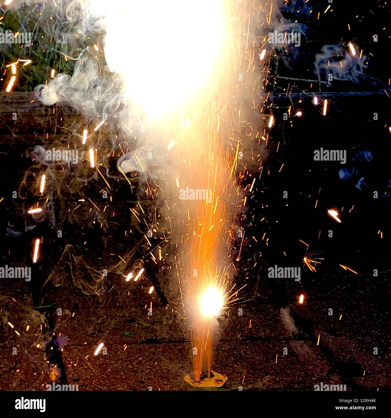 Legal consumer fireworks in backyard on July 4th USA Independence Day Stock Photo