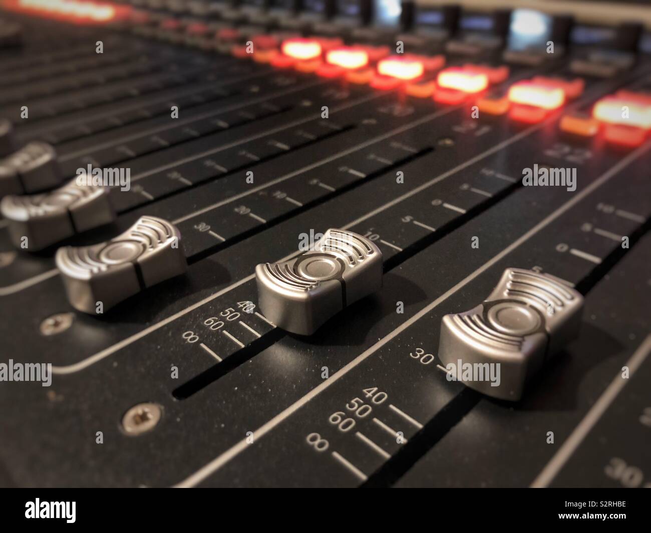 Knobs on a digital audio mixing console Stock Photo Alamy