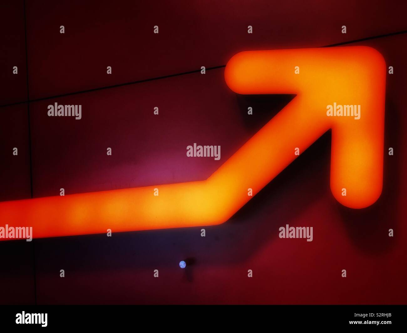 Red arrow showing direction - Smartphone Captured Stock Image