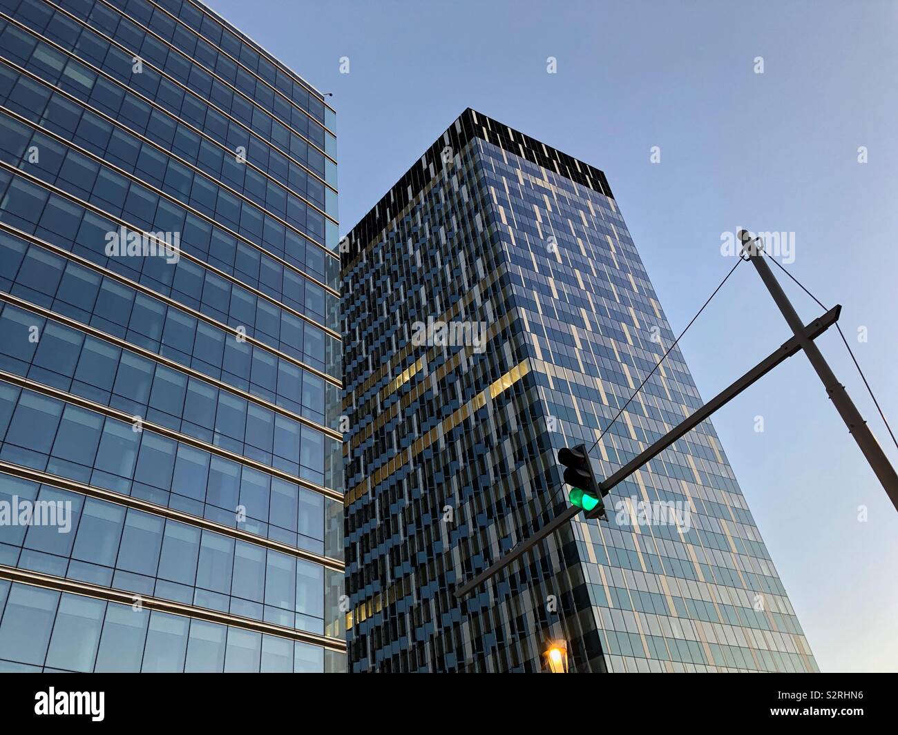 Green traffic light in Rue de la Loi next to the ‘Lex’ (left) and ‘The One’ buildings in the European Quarter of Brussels, Belgium. - Smartphone Captured Stock Image