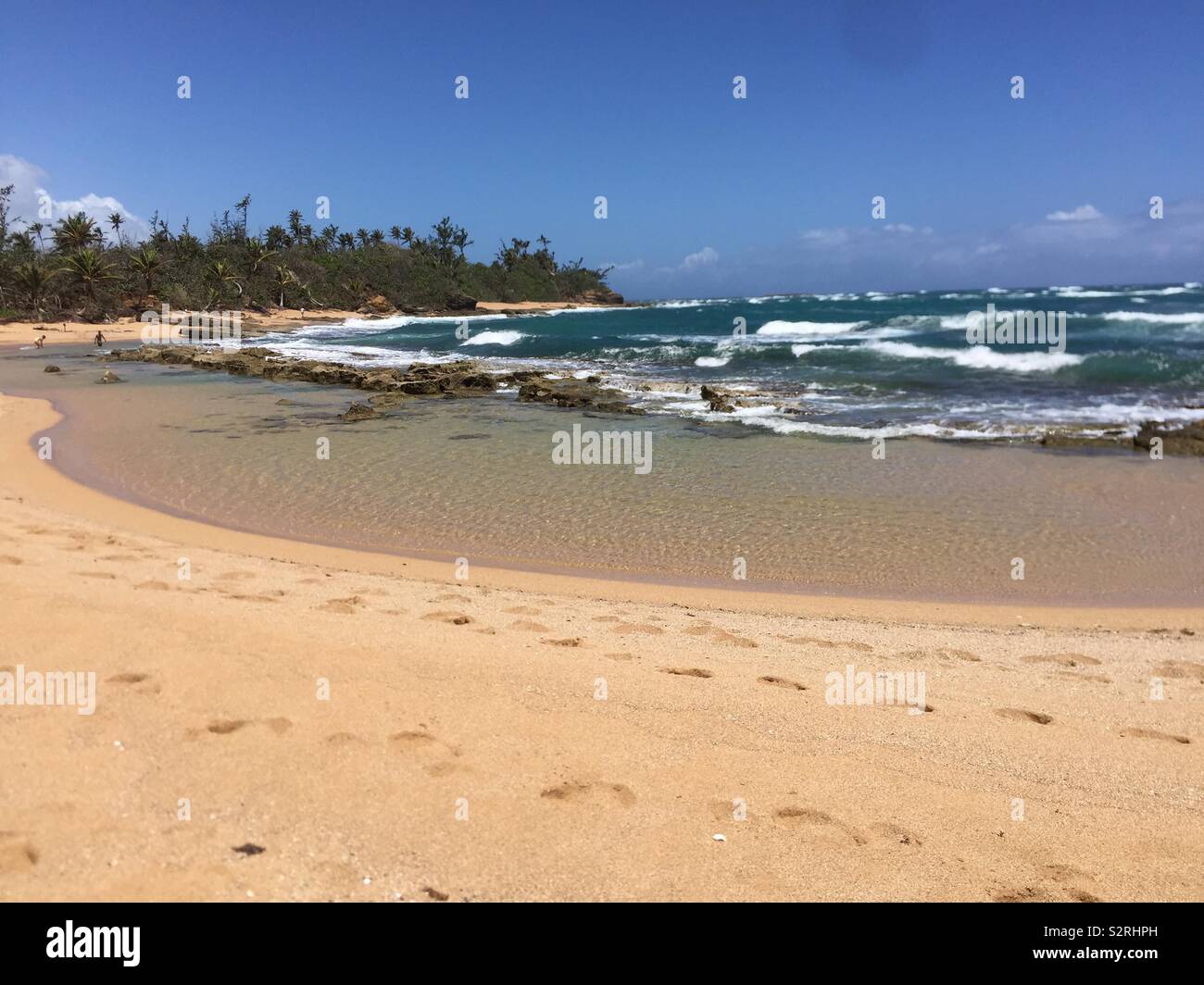 Piñones beach great swimming area. Have tropical food and dancing establishments . Stock Photo