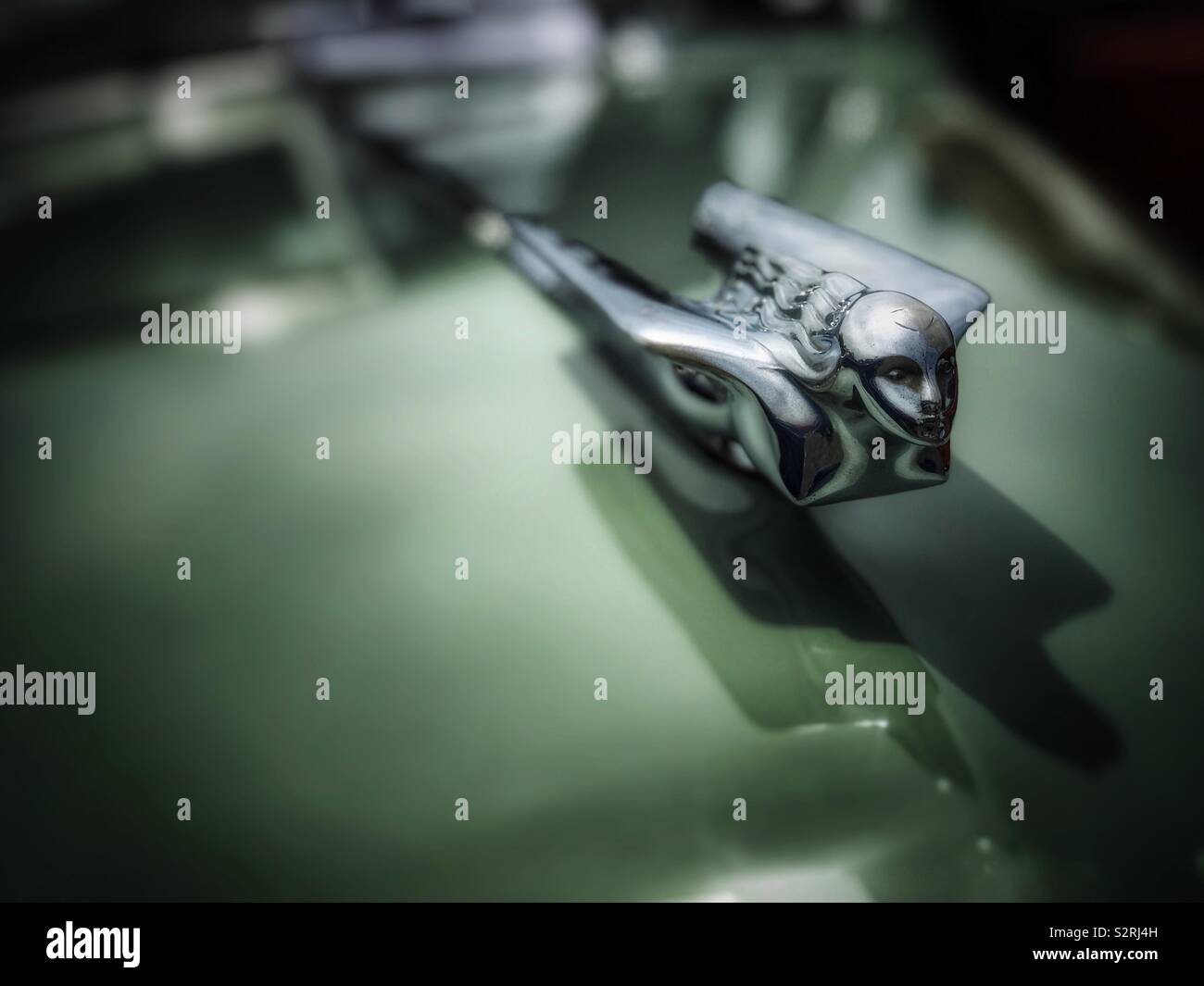 Hood ornament on a vintage Cadillac - Smartphone Captured Stock Image