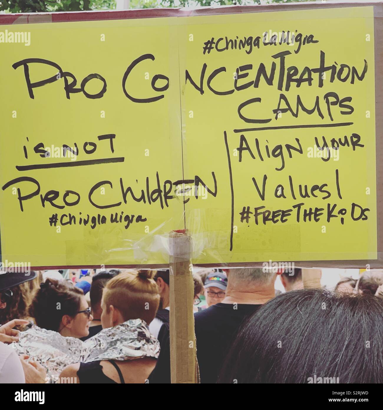 July 2, 2019. A sign reads “#ChingaLaMigra Pro Concentration Camps Is Not Pro Children. Align Your Values! #FreeTheKids,” at the Close the Camps Rally, Manhattan, New York, New York, United States. - Smartphone Captured Stock Image
