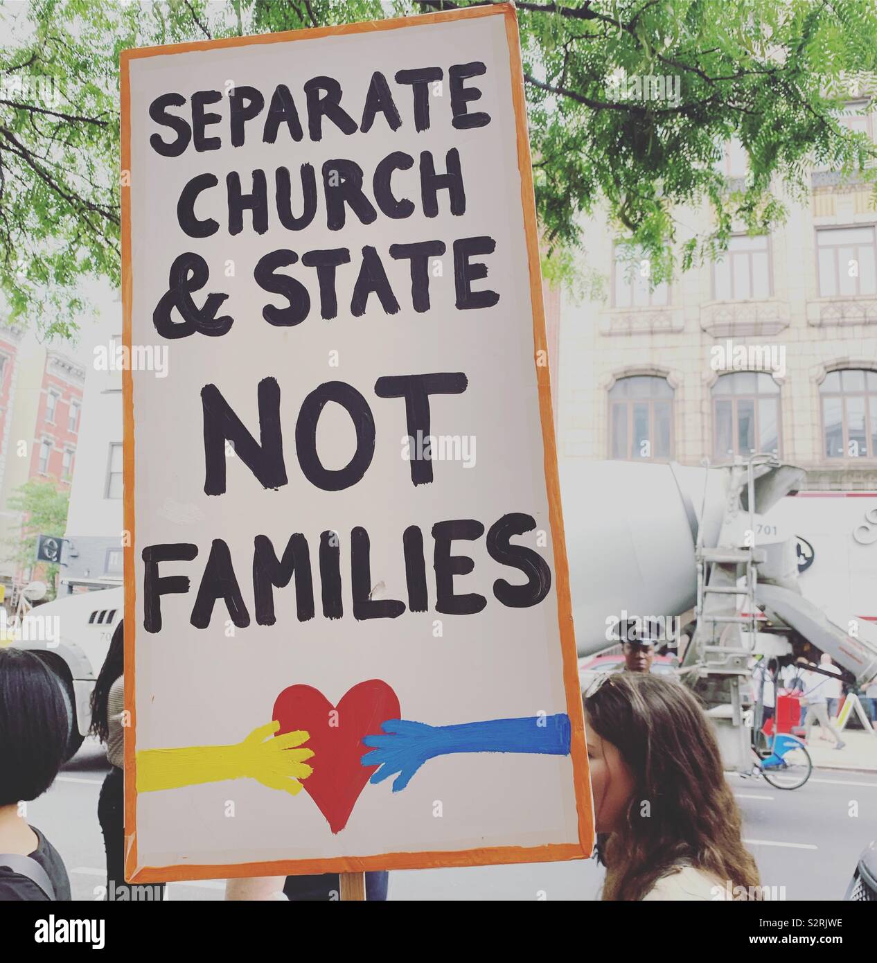 July 2, 2019. Close the Camps Rally, Middle Collegiate Church, Manhattan, New York, New York, United States. A sign reads “Separate Church & State Not Families.” - Smartphone Captured Stock Image
