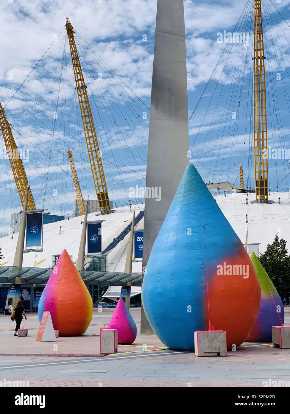 Greenwich, UK - 5 July 2019: Bright outdoor inflatable art at the 02 Arena. - Smartphone Captured Stock Image