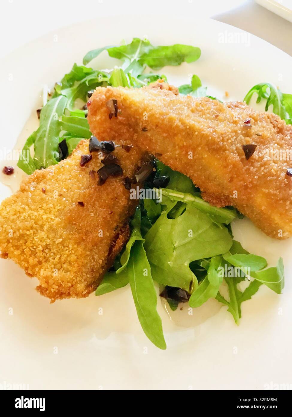 Deep fried Camembert cheese with rocket Stock Photo Alamy