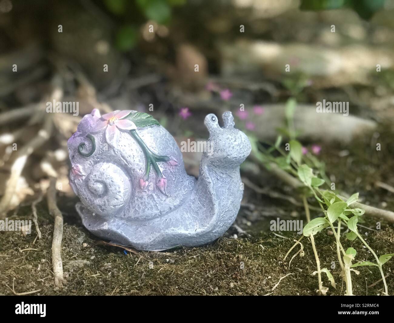 Ceramic snail hi-res stock photography and images - Alamy