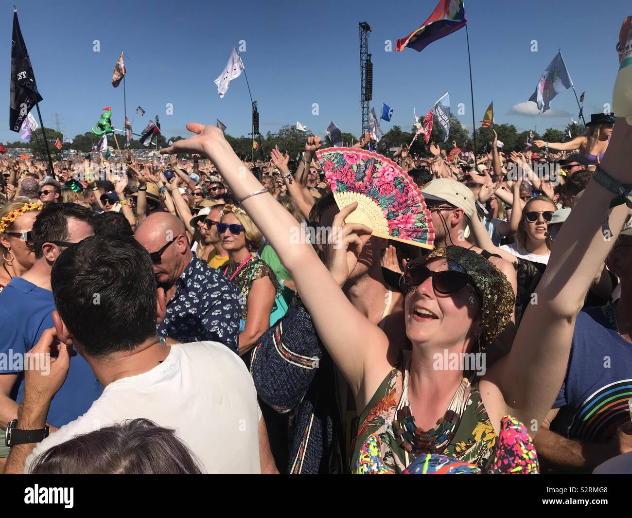 The huge crowd dancing to the set by Kylie Minogue at the Glastonbury Festival 2019 Stock Photo
