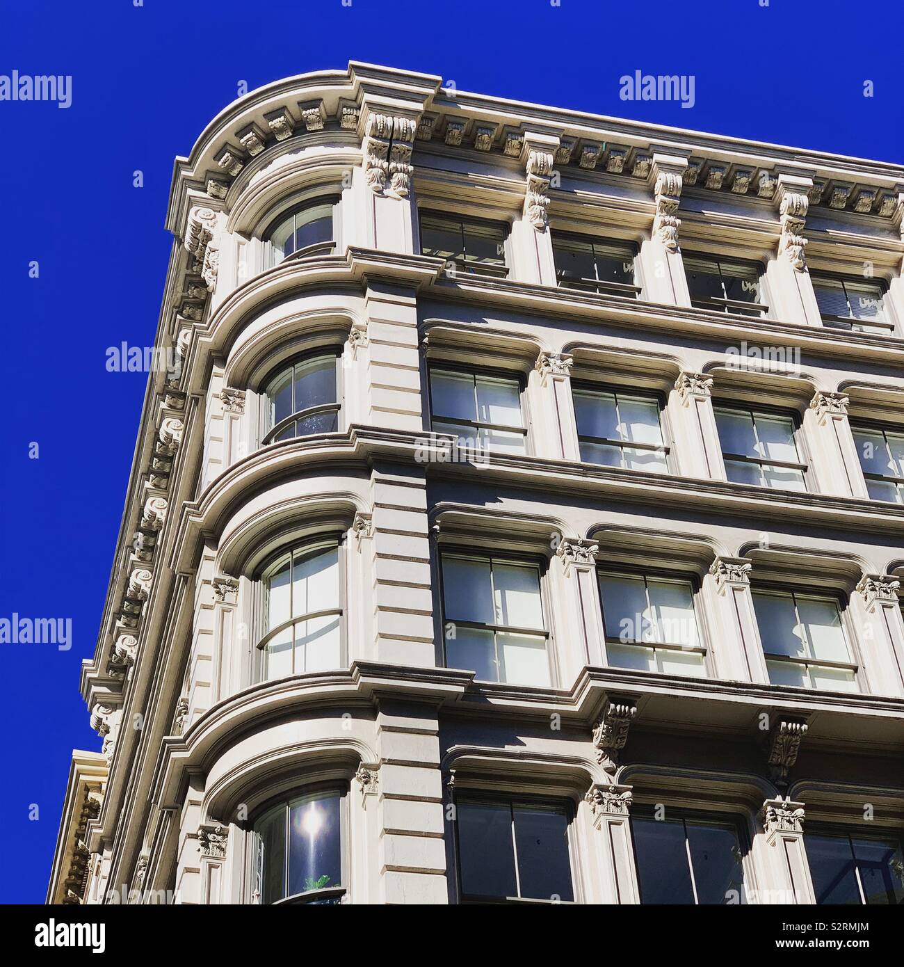 Corner of a cast iron building in SoHo, New York, New York, United States Stock Photo