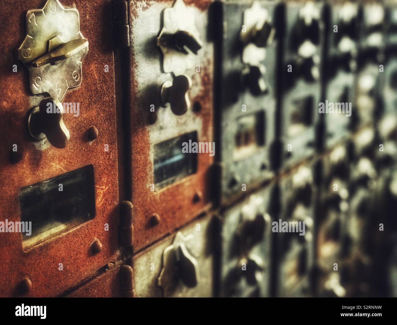 Row of old wooden post office boxes - Smartphone Captured Stock Image