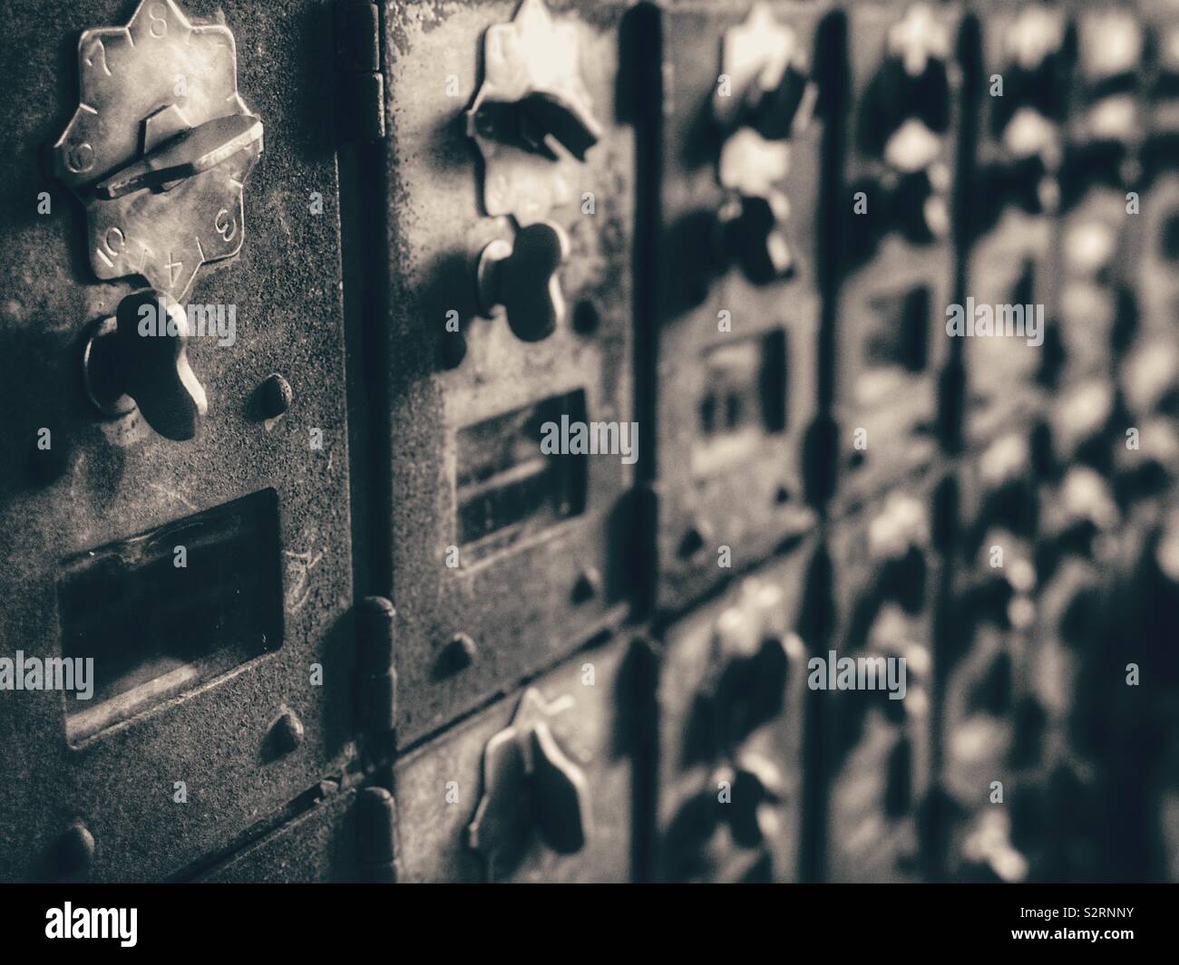 Row of old wooden post office boxes - Smartphone Captured Stock Image