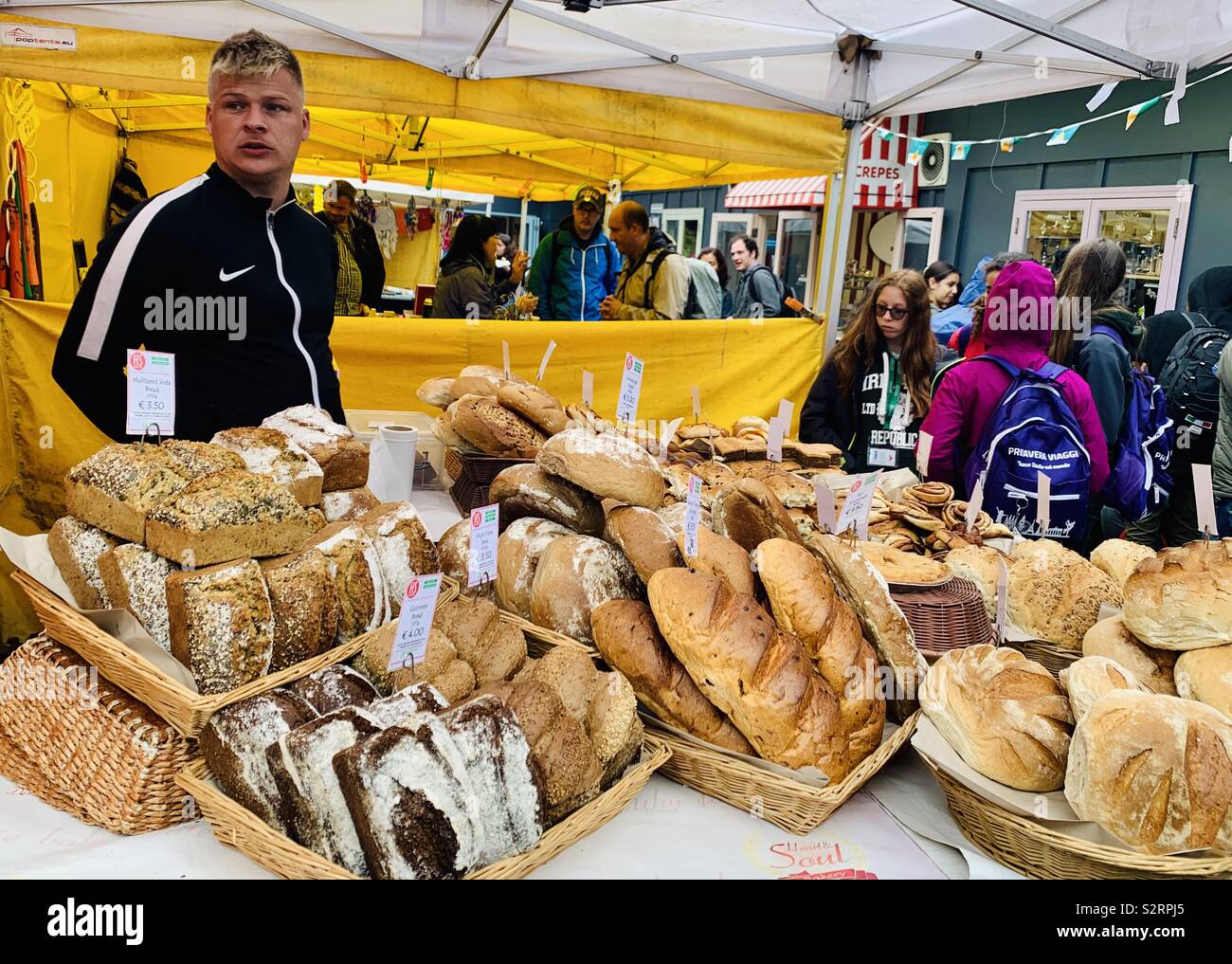 An Irish bread vendor at the Howth market in Ireland. - Smartphone Captured Stock Image