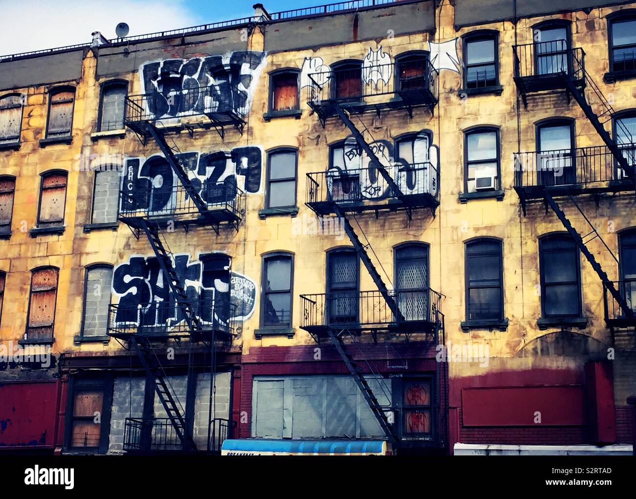 Abandoned apartment buildings in Chelsea, NYC, USA - Smartphone Captured Stock Image